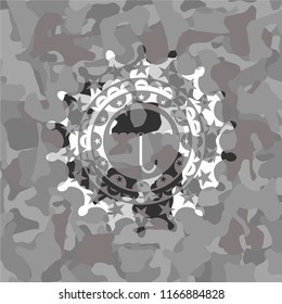 umbrella icon on grey camo texture