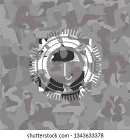 umbrella icon on grey camo pattern