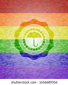 icono del paraguas sobre fondo de mosaico con los colores de la bandera LGBT