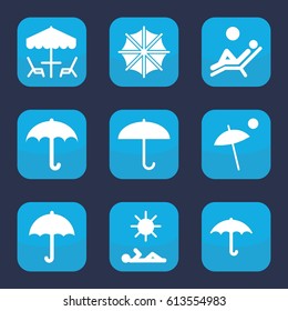 Umbrella icon. set of 9 filled umbrella icons such as keep dry cargo, man laying in sun