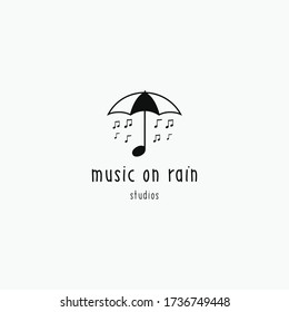 Umbrella with music note creative logo icon sign. Vector illustration isolated on white