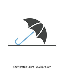 Imagen vectorial de icono de paraguas en tierra. También se puede utilizar para objetos varios. Adecuado para aplicaciones móviles, aplicaciones web y medios impresos.