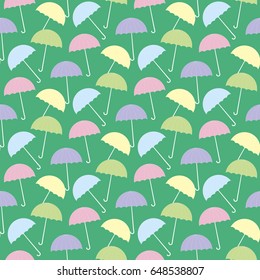 Umbrella pattern on the green background. Vector illustration
