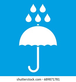 Umbrella and rain drops icon white isolated on blue background vector illustration