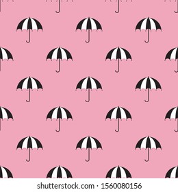 Umbrella seamless pattern. Black and white color on pink background. Design for textile, wallpaper, fabric. Vector 