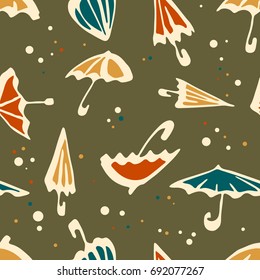 Umbrella seamless pattern. Colorful autumn background umbrella vector with dots and points.