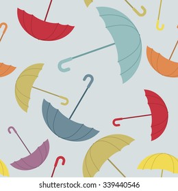 Umbrella seamless pattern. Many of colour opened umbrellas. Cute texture protection from rain. Retro fabric ornament.
