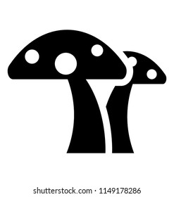 
An umbrella shaped vegetable with dots on it known as mushroom usually grown in  muddy water 
