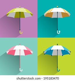 Umbrella sign.  Various color and design parasol. 