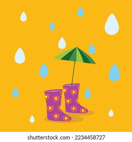 an umbrella stands in a rubber boot in the rain