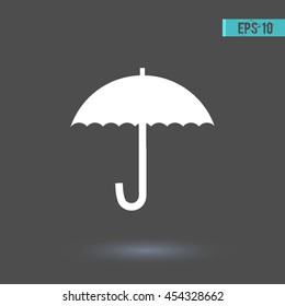Umbrella vector icon. Graphic symbol for web design, logo. White glyph on a gray background. Isolated sign.