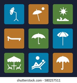 umbrella vector icons. Set of 9 umbrella filled icons such as sunbed, man laying in sun