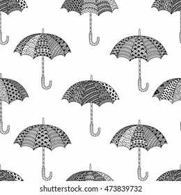 Umbrellas - autumn pattern. Cute cartoon ornament. Doodle style zentangle. Geometric elements of hand-drawn. Black and white vector illustration.