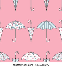 Umbrellas with different color patterns. Seamless vector illustration on pink background.