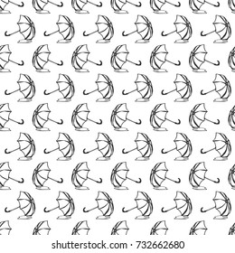 Umbrellas seamless pattern, vector background. Opened umbrellas lie in a puddle of water on white background. For wallpaper design, wrappers, fabrics, decorating.