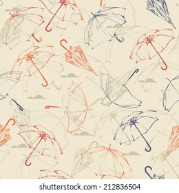 Umbrellas. Seamless pattern in vintage style. Vector autumn doodles design.  Season of the rain.