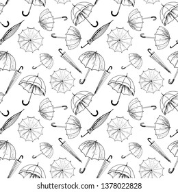 Umbrellas seamless sketch pattern. Black hand drawn umbrellas without background. Wallpaper pattern, doodle of umbrellas. Vector backdrop.