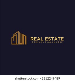 UN initial monogram logo for real estate with building style