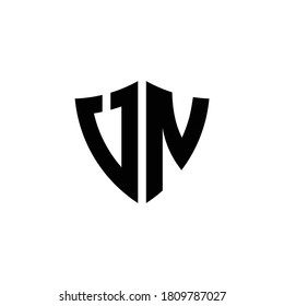 UN monogram logo with shield shape design template isolated on white background