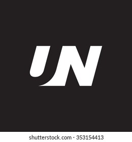 UN negative space letter logo black background