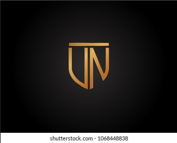 UN shield shape Letter Design in gold color