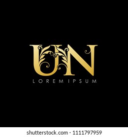 UN U N Gold Letter Logo With Luxury Floral Design