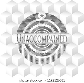Unaccompained grey badge with geometric cube white background
