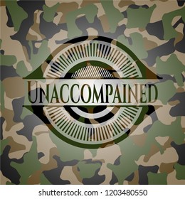 Unaccompained written on a camouflage texture
