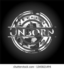 Unborn on grey camouflage pattern