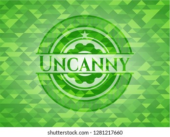 Uncanny green emblem with triangle mosaic background