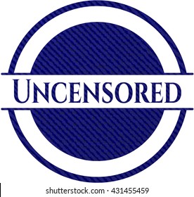 Insignia sin censurar con fondo de denim
