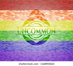 Uncommon emblem on mosaic background with the colors of the LGBT flag