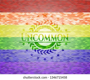 Uncommon emblem on mosaic background with the colors of the LGBT flag