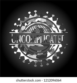 Uncomplicated on grey camouflage texture