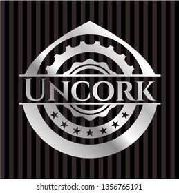 Uncork silvery emblem