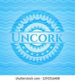 Uncork water wave representation style badge.