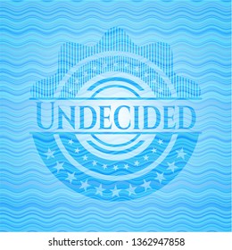 Undecided sky blue water wave emblem.