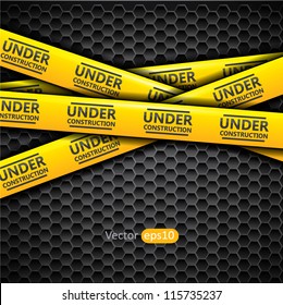 Under construction caution tape on metallic background, vector