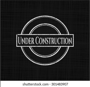 Emblema de pizarra de construcción escrito en una pizarra