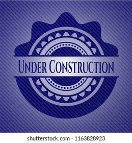 Under Construction emblem with jean high quality background