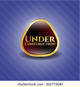 Under Construction gold shiny emblem