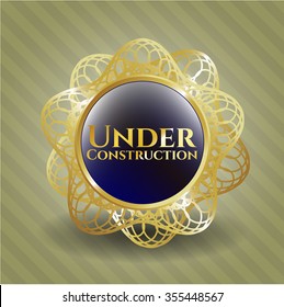 Under Construction golden emblem or badge