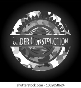 Under Construction grey camouflage emblem. Vector Illustration.