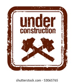 under construction grunge rubber stamp with two hammers