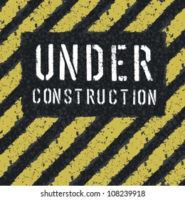 Under construction message on asphalt background. Vector, EPS8