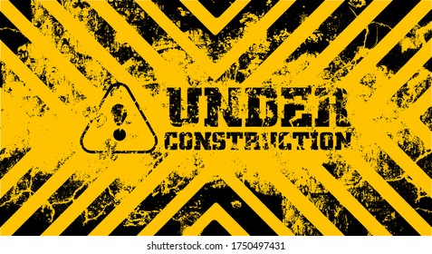 under construction on warning sign.