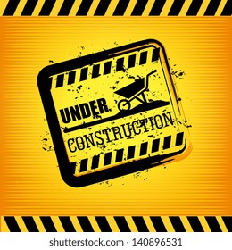 under construction print over yellow background vector illustration