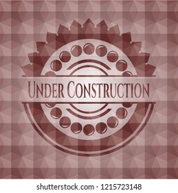 Under Construction red seamless emblem or badge with abstract geometric pattern background.