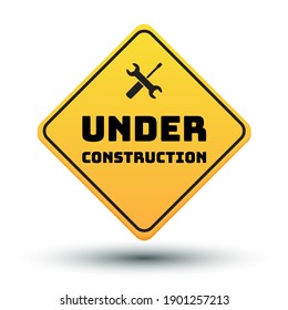 under construction road sign with shadow isolated on white background