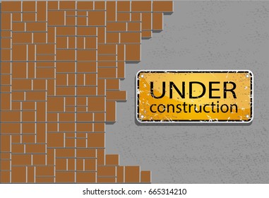 under construction sign on cement wall and modern brick, interiors safety concept